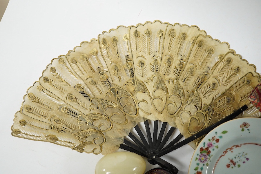 A Chinese famille rose plate a vellum fan, a small group of miniature books, lacquer box and onyx egg, fan 35cm wide. Condition - plate slight chip, rest fair to good